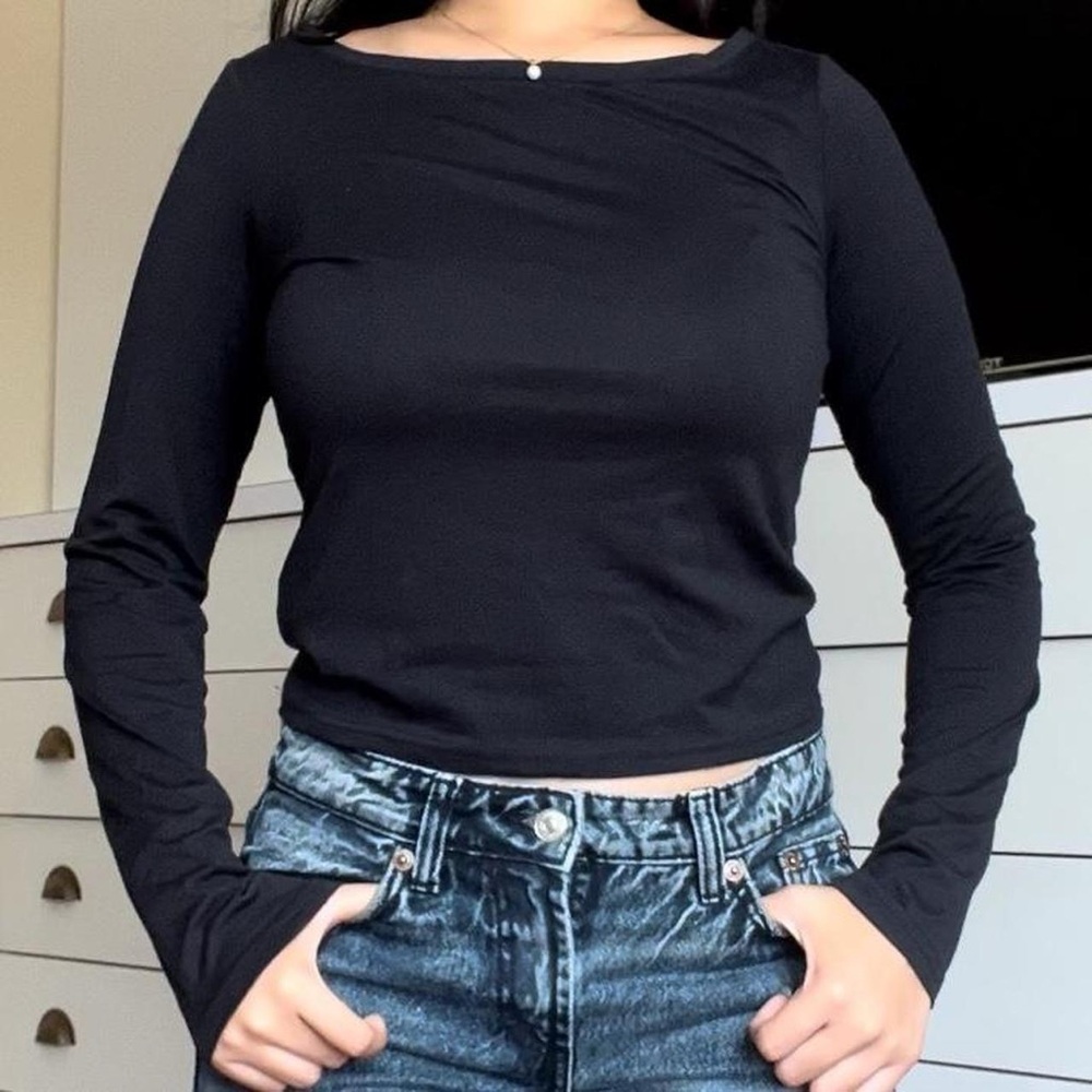 slightly worn model off duty top
